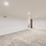 3178 Salem St Aurora CO 80011-large-017-015-Lower Level Family Room-1500×1000-72dpi